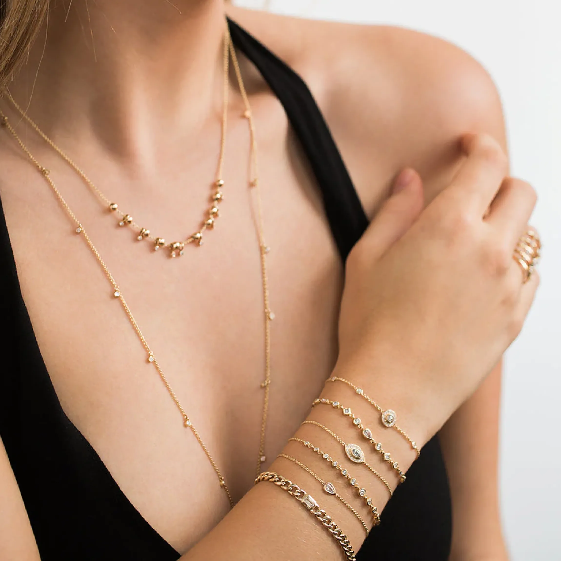 Bezel Set Emerald Cut Diamond on Medium Curb Chain Bracelet