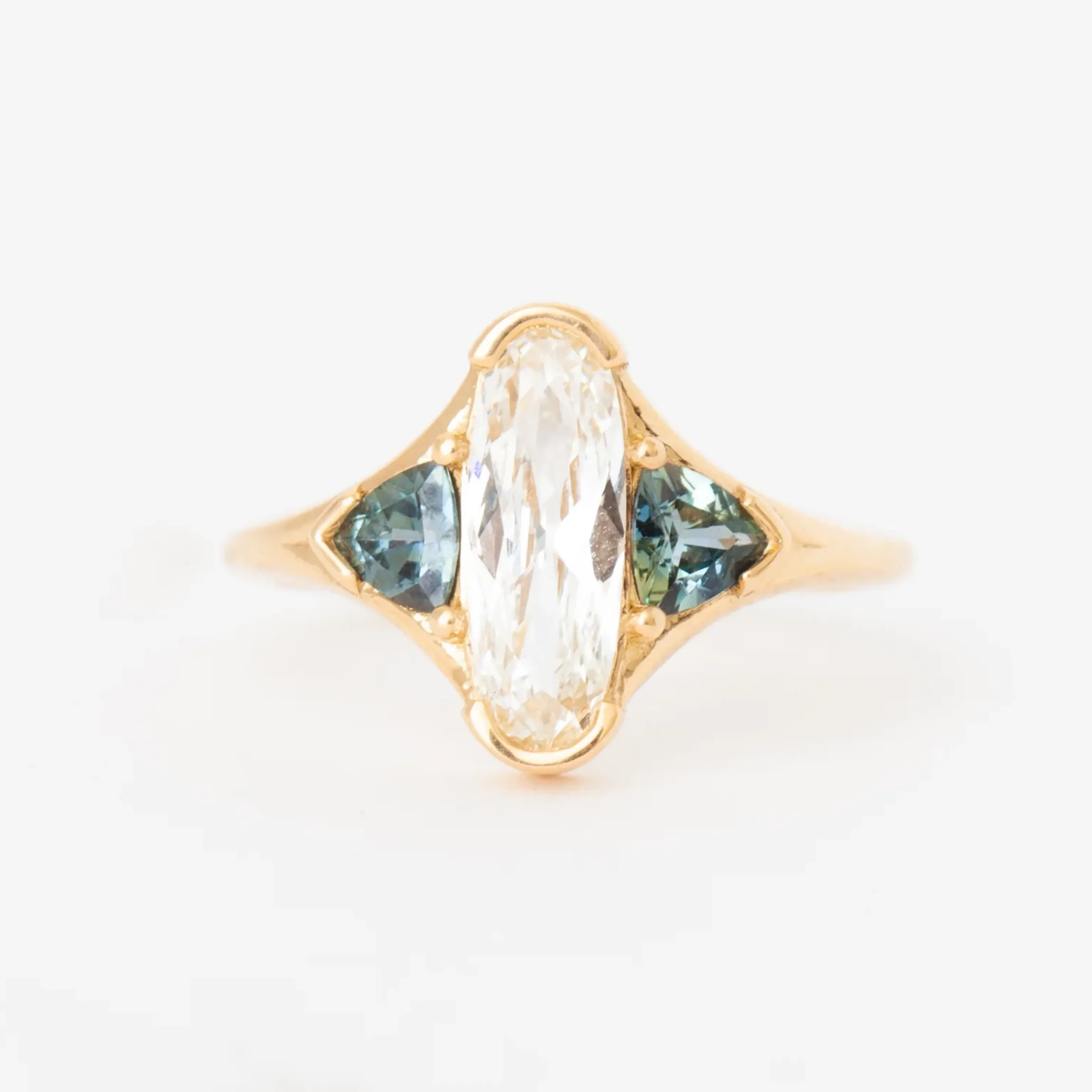 Elongated Oval & Sapphire Trillion Ring