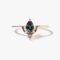 Medium Pear Cut Teal Sapphire and Diamond Nestled Ring