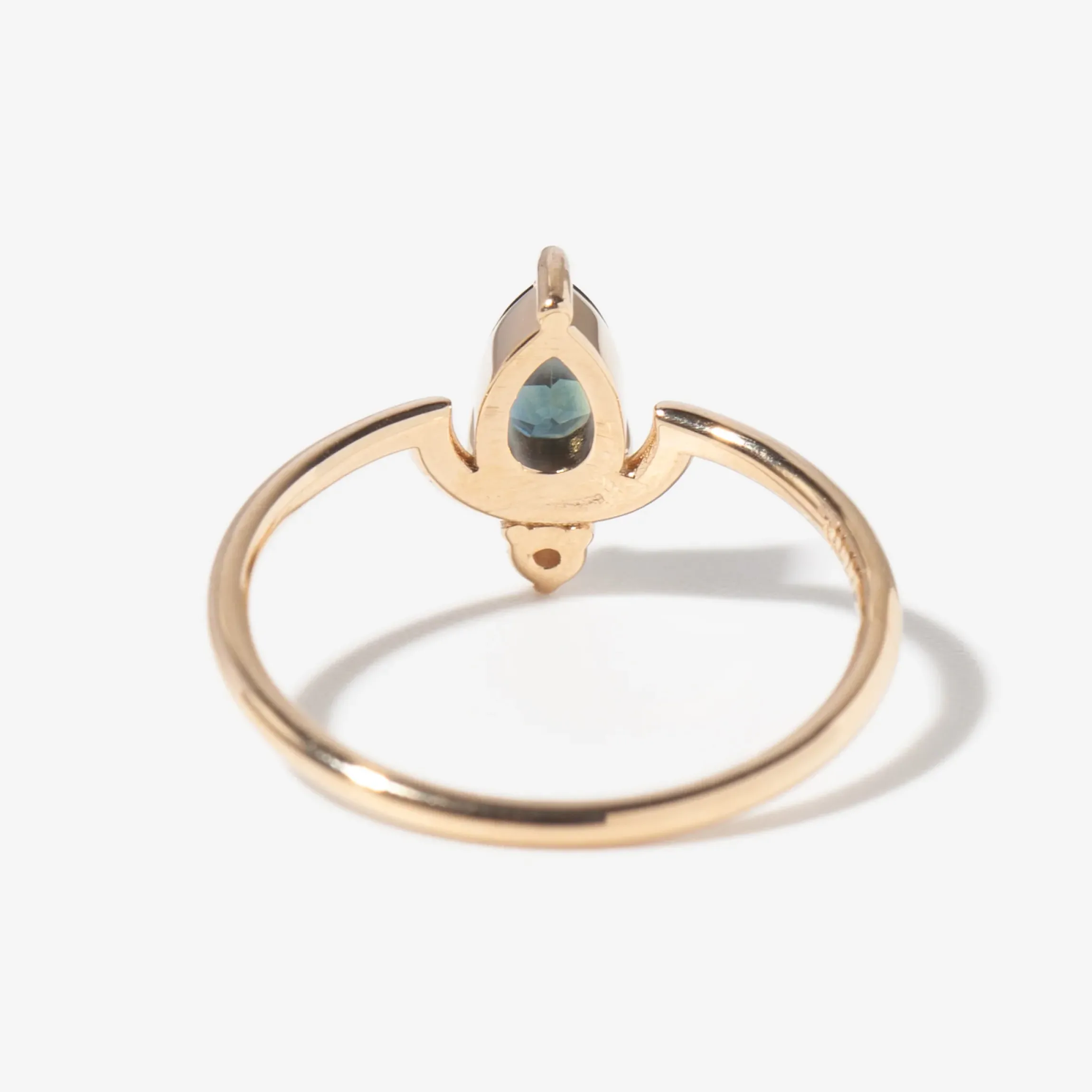 Medium Pear Cut Teal Sapphire and Diamond Nestled Ring